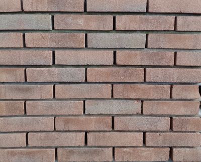 metselstenen waalformaat bruinrood op een gemetselde muur oppervlak