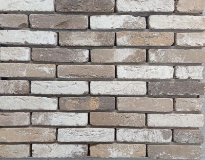 Metselsteen taupe grijs antiek getrommeld waalformaat.