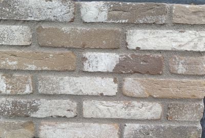 Metselsteen taupe grijs antiek getrommeld waalformaat.