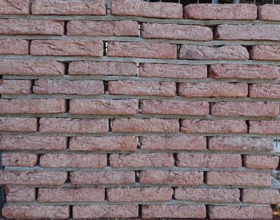 Metselsteen Rijnformaat roodgrijs plint handvorm.