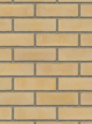 dikformaat metselstenen geel op een gemetselde muur