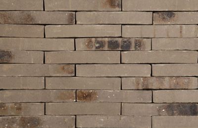 hilversumformaat metselstenen grijs gemetseld als voorbeeldmuur voor een woning