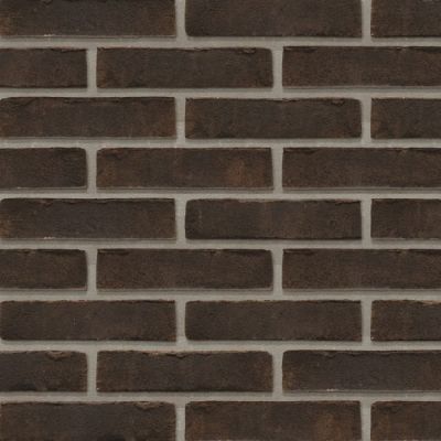 waalformaat steenstrips bruin metselwerk voor een accentmuur binnenshuis
