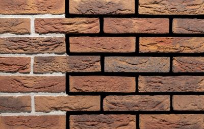 metselstenen waalformaat rood gemetseld in halfsteensverband en wildverband