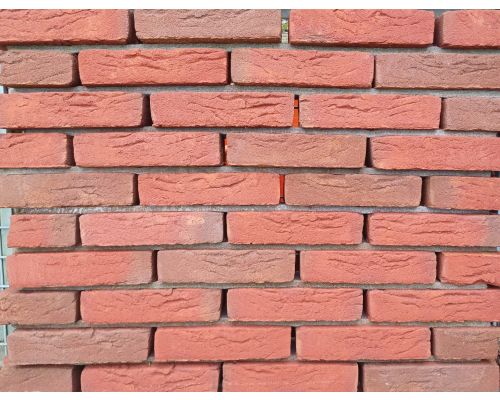 Metselsteen Alems bont rood handvorm waalformaat.